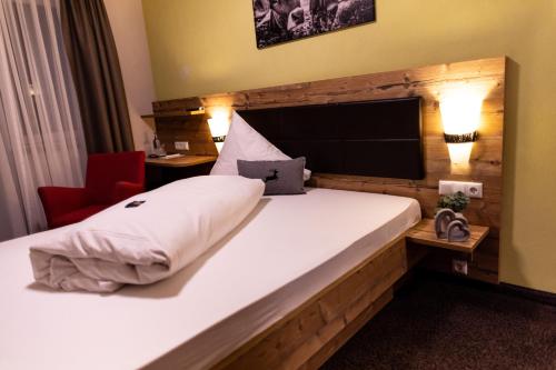 Letto o letti in una camera di Gasthof Engel
