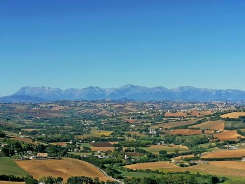 a view of a valley with mountains in the background at Resort Orizzonti in SantʼElpidio a Mare