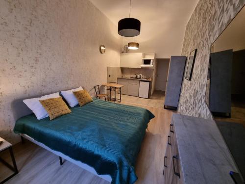 Katil atau katil-katil dalam bilik di Apartamenty 21 Stare Miasto