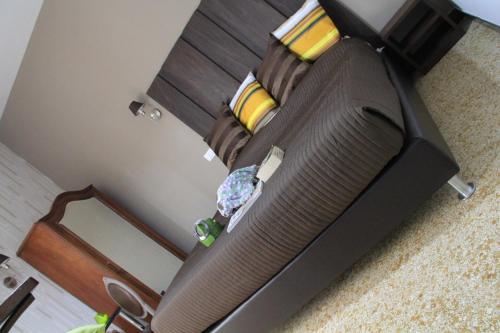 an overhead view of a couch in a living room at Hotel Bologna in Genova
