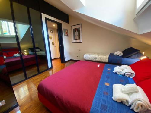 מיטה או מיטות בחדר ב-Lecco Centro