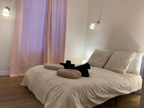 Krevet ili kreveti u jedinici u okviru objekta L’Albuconis 5 logement entier