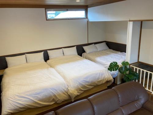 เตียงในห้องที่ Koya TRIBE - Vacation STAY 83407v