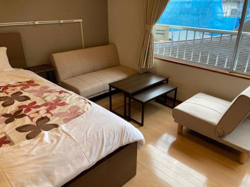 เตียงในห้องที่ Koya TRIBE - Vacation STAY 83403v