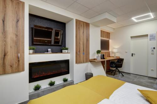 Kuchyň nebo kuchyňský kout v ubytování Riverside Inn - dunaparti szuterén