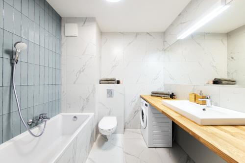 Kúpeľňa v ubytovaní Apartament Nadmotławski Sen