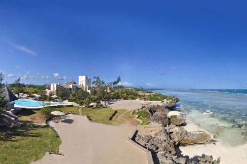 an aerial view of a beach and the ocean at The Charming Lonno Lodge Watamu in Watamu