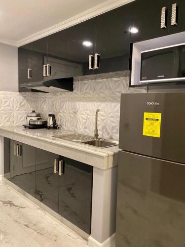 Una cocina o cocineta en City View at MAKATI Prime Luxury