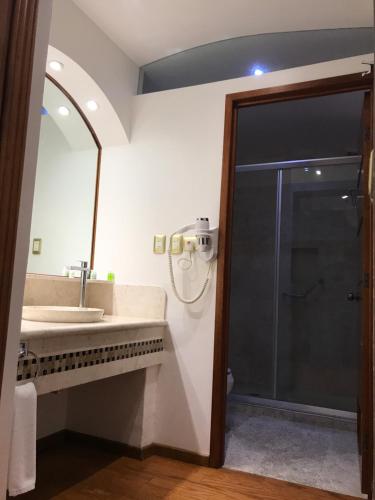 Ванная комната в Hotel Malinalli