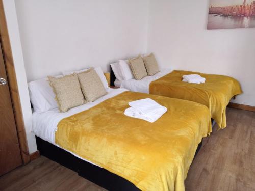 Postel nebo postele na pokoji v ubytování Budget Rooms