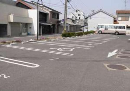 an empty parking lot with a van parked in the street at SAIDAIJI GRAND HOTEL - Vacation STAY 67891v in Setouchi