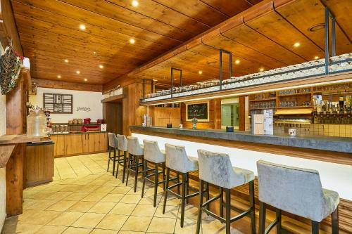 Um restaurante ou outro lugar para comer em Hotel Rupertihof