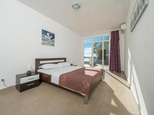 Cama o camas de una habitación en Berg Apartments