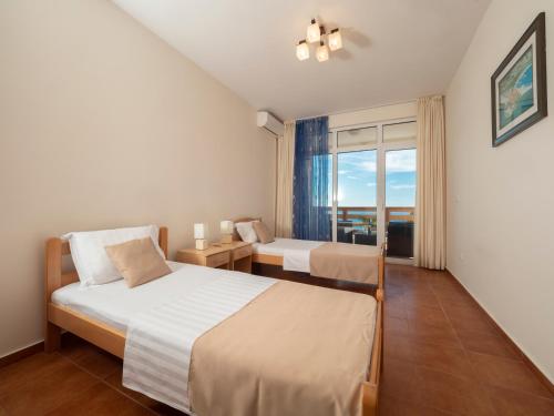 Cama o camas de una habitación en Berg Apartments