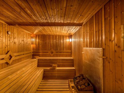 an empty wooden sauna with wooden floors and ceilings at Blue Dreams Resort Bodrum - Aquapark & Ultra All Inclusive in Torba