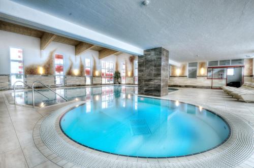 Bazén v ubytovaní Appartement & Suiten Hotel Glöcknerin alebo v jeho blízkosti