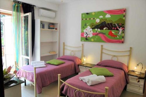 Postel nebo postele na pokoji v ubytování VILLA LINA a 500 mt dal mare