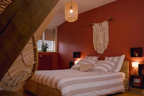 Katil atau katil-katil dalam bilik di Les 3 Bérets chambres d'hotes