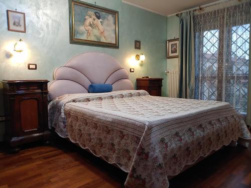 En eller flere senger på et rom på Nonna Genoveffa, camere