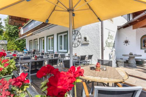 Um restaurante ou outro lugar para comer em Hotel Rupertihof