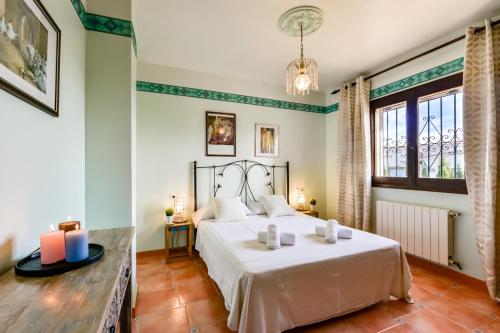 Postel nebo postele na pokoji v ubytování Villas Guzman - Petra