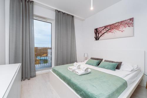 Llit o llits en una habitació de EXCLUSIVE Venice Apartments