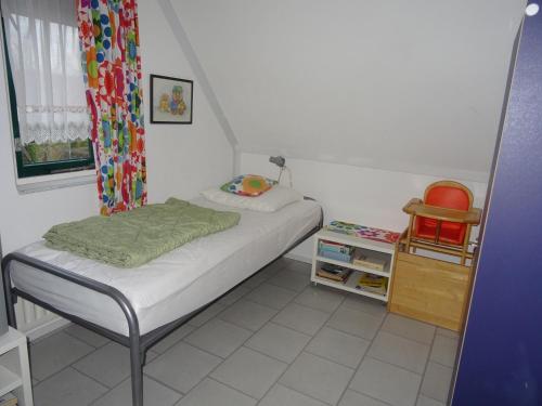 Postel nebo postele na pokoji v ubytování Kustverhuur, Park Schoneveld, Zeemeeuw 138