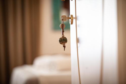 Katil atau katil-katil dalam bilik di Giardini Calce - Luxury Rooms