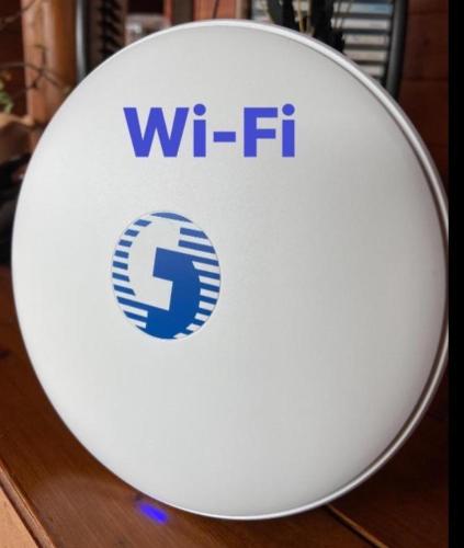 a white bowl with the wfir logo on it at 薔薇谷 民宿字108號 in Fuxing