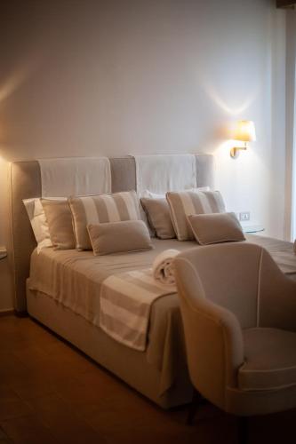 Katil atau katil-katil dalam bilik di Giardini Calce - Luxury Rooms