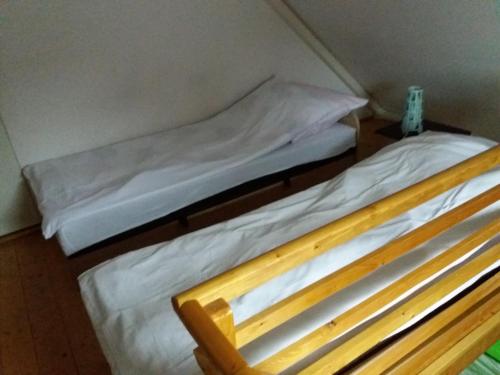 Postel nebo postele na pokoji v ubytování U Adama