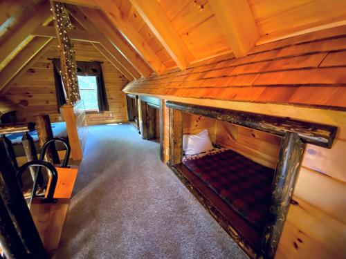 an overhead view of a room in a log cabin at BC Log cabin with private beach river fire pit AC wifi onsite trails ski slope views in Carroll
