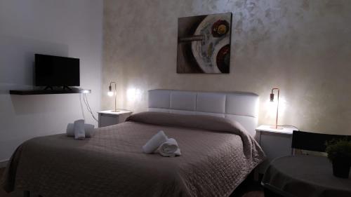 Ένα ή περισσότερα κρεβάτια σε δωμάτιο στο CconfortHotels R&B Dolci Risvegli - SELF CHECK IN