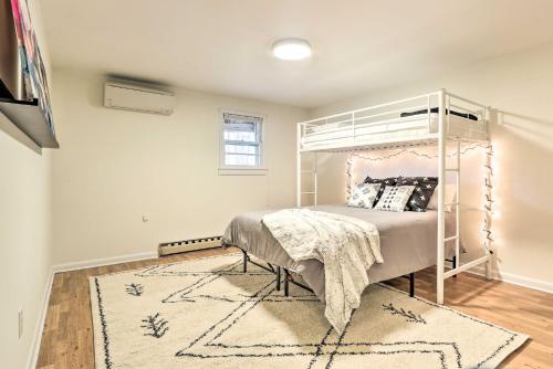 a bedroom with a white bunk bed and a rug at Fireside Lodge A-Frame in Bryce Resort with Decks in Basye