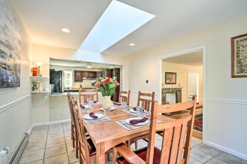 a dining room with a wooden table and chairs at 20 Mi to Philly Inviting Home with Yard in Wayne! in Wayne