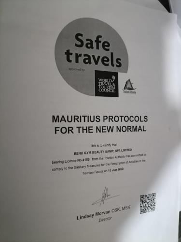 a sign for a nautilus protocols for the new normal at Reviva Residence in Blue Bay