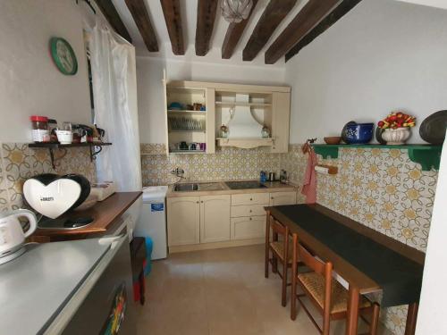 Kuchyň nebo kuchyňský kout v ubytování Residenza oleandro rosa