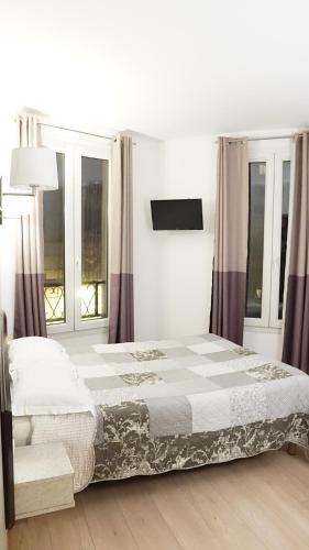 Cama ou camas em um quarto em Hotel de l'Europe