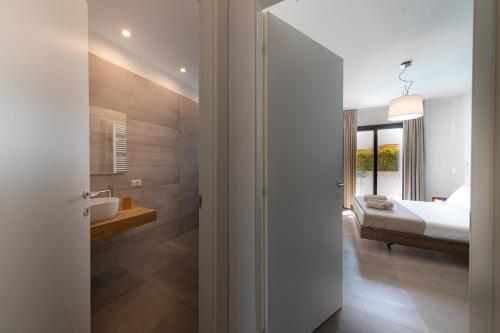 Et badeværelse på Gelso Bianco Boutique Apartments