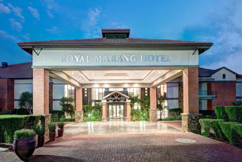 a hotel with a sign that reads royal dancing hotel at Royal Marang Hotel in Phokeng
