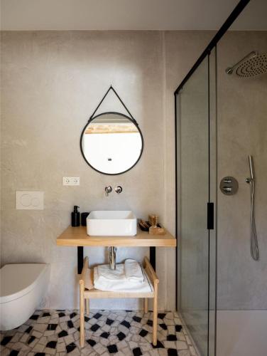 a bathroom with a sink and a shower at SOLOA LANDETXEA in Bakio