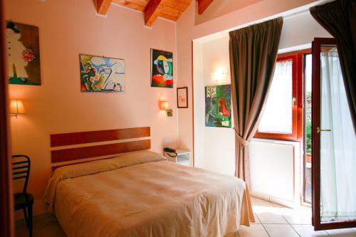 Ένα ή περισσότερα κρεβάτια σε δωμάτιο στο Nido Verde