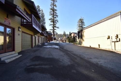 an empty street in front of a building at COZY Condo at Canyon Lodge! Sleeps 8, a walk to Canyon Lodge in Mammoth Lakes