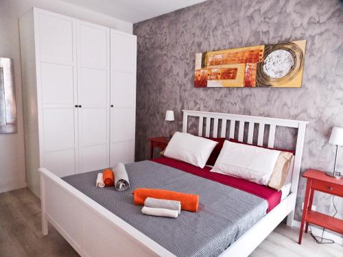 Una cama o camas en una habitación de Casa Federico - beauty apartment with wonderful terrace
