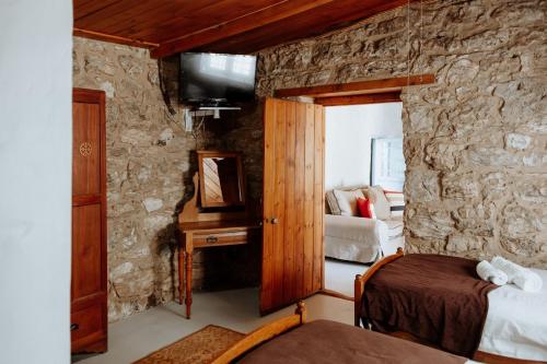 Una cama o camas en una habitación de Komyntjie 1
