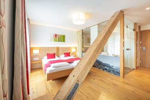 Postel nebo postele na pokoji v ubytování Hotel Loy