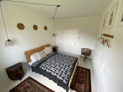 سرير أو أسرّة في غرفة في Landhaus Südburgenland