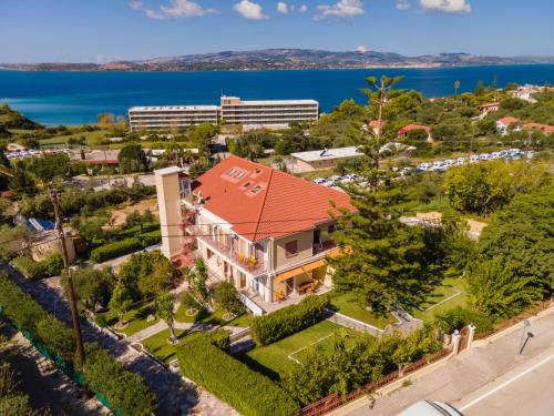 an aerial view of a house with a red roof at Lorenzo House Apartments in Lassi