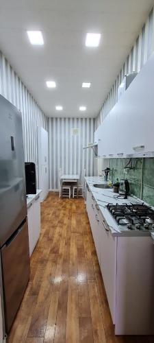 Кухня або міні-кухня у Suliko - Your Cosy Apartment in the Center