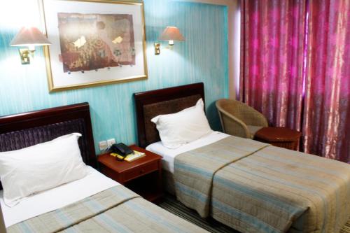 Легло или легла в стая в New Mwanza Hotel